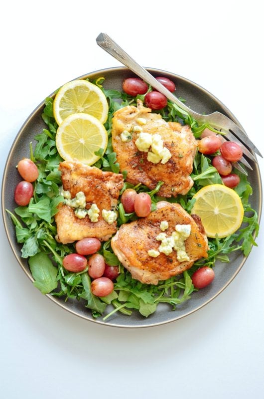 One-Skillet Chicken Thighs With Roasted Grapes and Blue Cheese