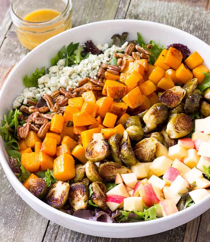 ROASTED BUTTERNUT SQUASH & BRUSSELS SPROUTS HARVEST SALAD WITH MAPLE CIDER VINAIGRETTE