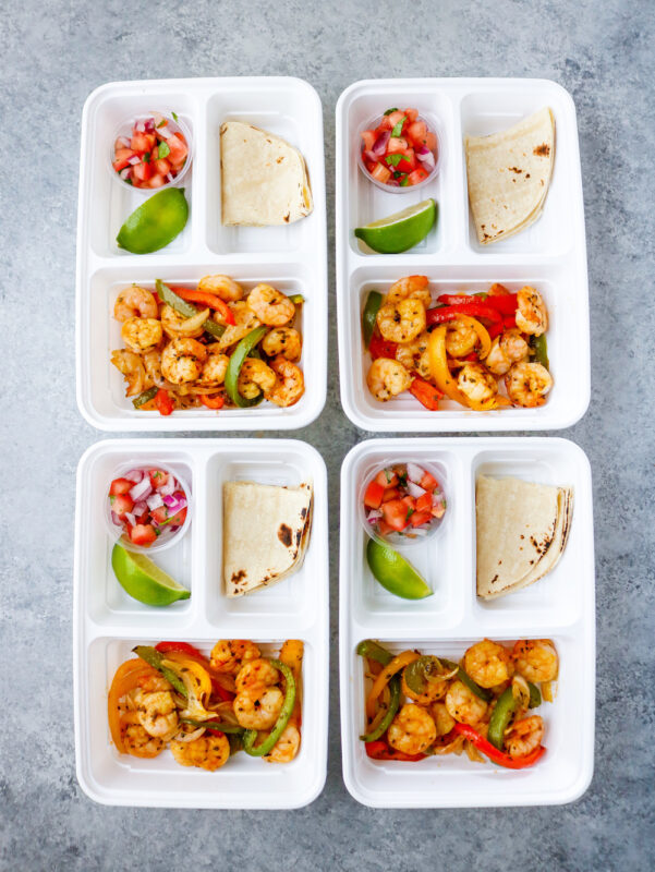 https://mealpreponfleek.com/wp-content/uploads/2019/08/Sheet-Pan-Shrimp-Fajitas-Multi-Container-601x800.jpg