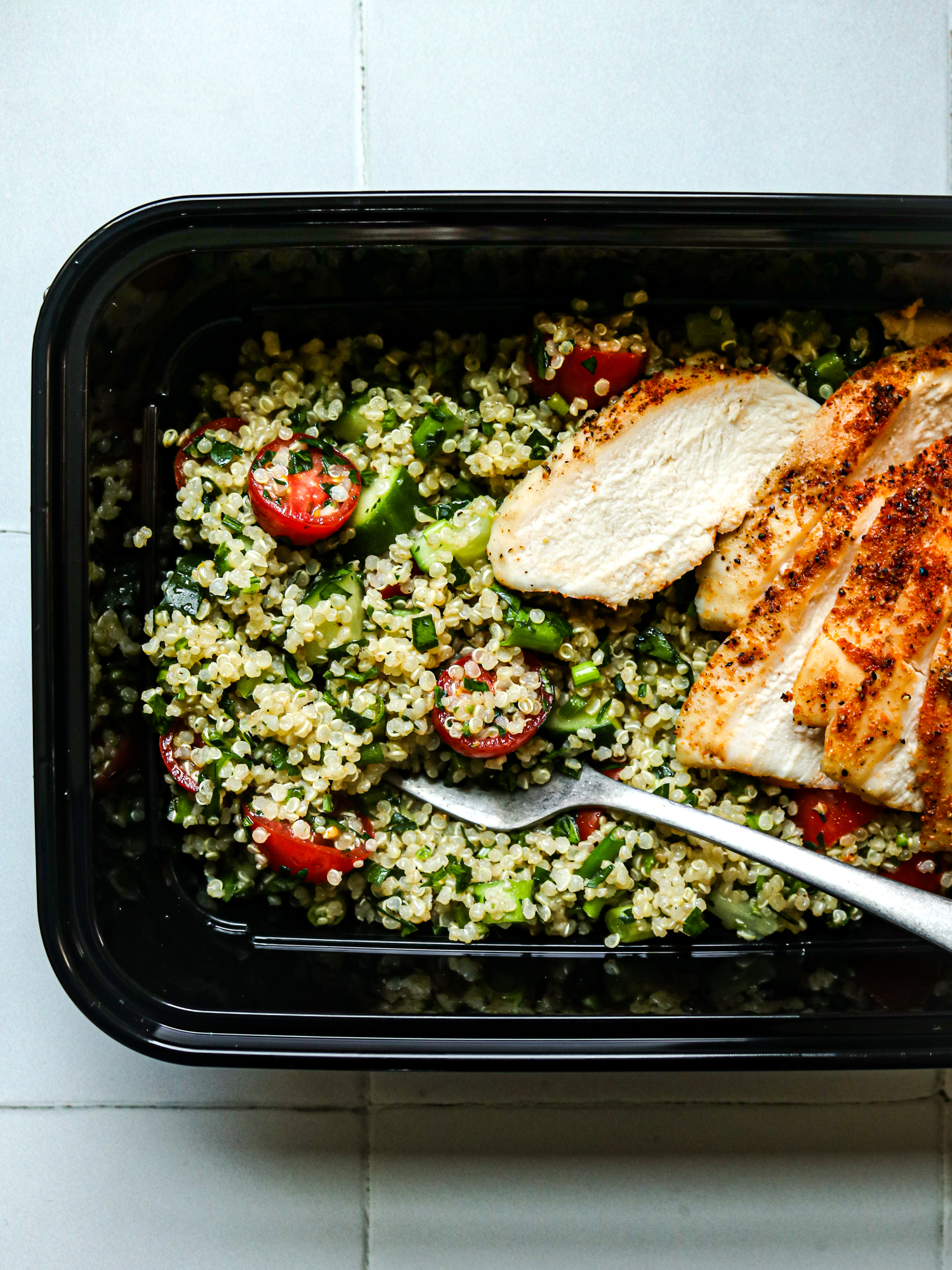 Chicken Quinoa Tabbouleh Bowl with fork