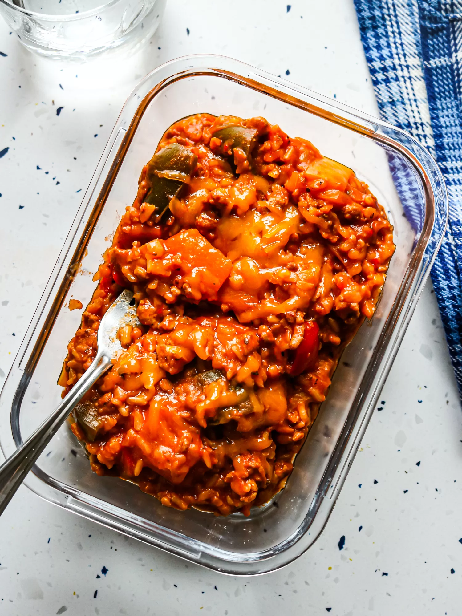 Unstuffed peppers in a glass meal prep container 